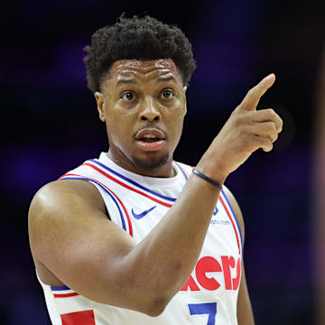 Kyle Lowry gestures during a game against the Kings.
