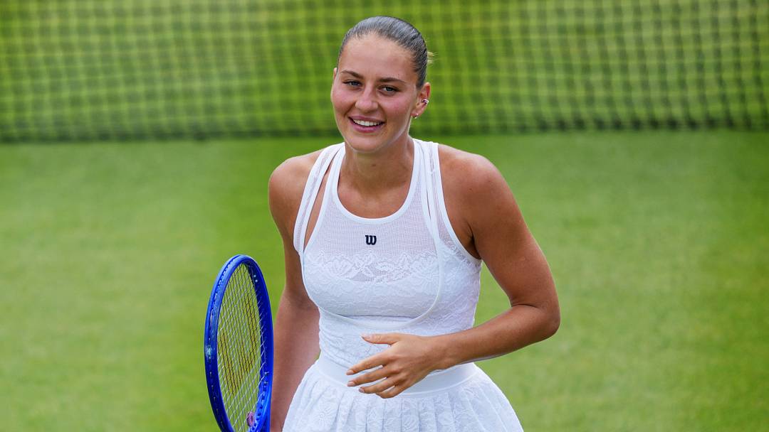 Marta Kostyuk wore a lace Wilson dress at the 2026 Wimbledon Championships. Marta Kostyuk wore a lace Wilson dress at the 2026 Wimbledon Championships.
