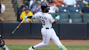 Tampa Bay Rays third baseman Junior Caminero (13) singles against the Detroit Tigers in the sixth inning at George M. Steinbrenner Field. 