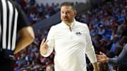 Feb 15, 2025; Oxford, Mississippi, USA; Mississippi Rebels head coach Chris Beard reacts toward an official during the first half against the Mississippi State Bulldogs at The Sandy and John Black Pavilion at Ole Miss. Mandatory Credit: Petre Thomas-Imagn Images