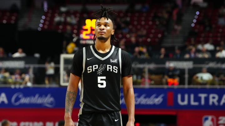 Jul 13, 2024; Las Vegas, NV, USA; San Antonio Spurs guard Stephon Castle (5) walks up court during the third quarter against the Portland Trail Blazers at Thomas & Mack Center. Mandatory Credit: Stephen R. Sylvanie-USA TODAY Sports