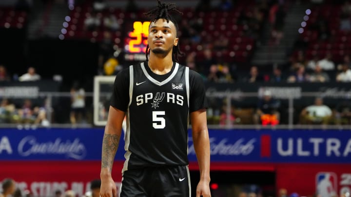 Jul 13, 2024; Las Vegas, NV, USA; San Antonio Spurs guard Stephon Castle (5) walks up court during the third quarter against the Portland Trail Blazers at Thomas & Mack Center. Mandatory Credit: Stephen R. Sylvanie-USA TODAY Sports