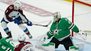 Apr 19, 2025; Dallas, Texas, USA; Colorado Avalanche defenseman Devon Toews (7) scores on Dallas Stars goaltender Jake Oettinger (29) during the third period in game one of the first round of the 2025 Stanley Cup Playoffs at American Airlines Center. Mandatory Credit: Raymond Carlin III-Imagn Images