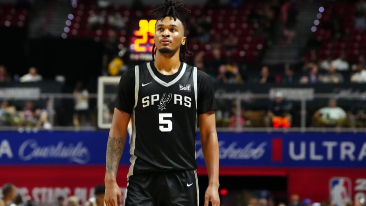 Jul 13, 2024; Las Vegas, NV, USA; San Antonio Spurs guard Stephon Castle (5) walks up court during the third quarter against the Portland Trail Blazers at Thomas & Mack Center. Mandatory Credit: Stephen R. Sylvanie-USA TODAY Sports