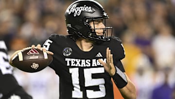 Quarterback Conner Weigman (15) has committed to the Houston Cougars.