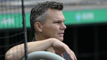 Aug 25, 2021; Pittsburgh, Pennsylvania, USA;  Pittsburgh Pirates general manager Ben Cherington looks on during batting practice before the game against the Arizona Diamondbacks at PNC Park. Mandatory Credit: Charles LeClaire-Imagn Images