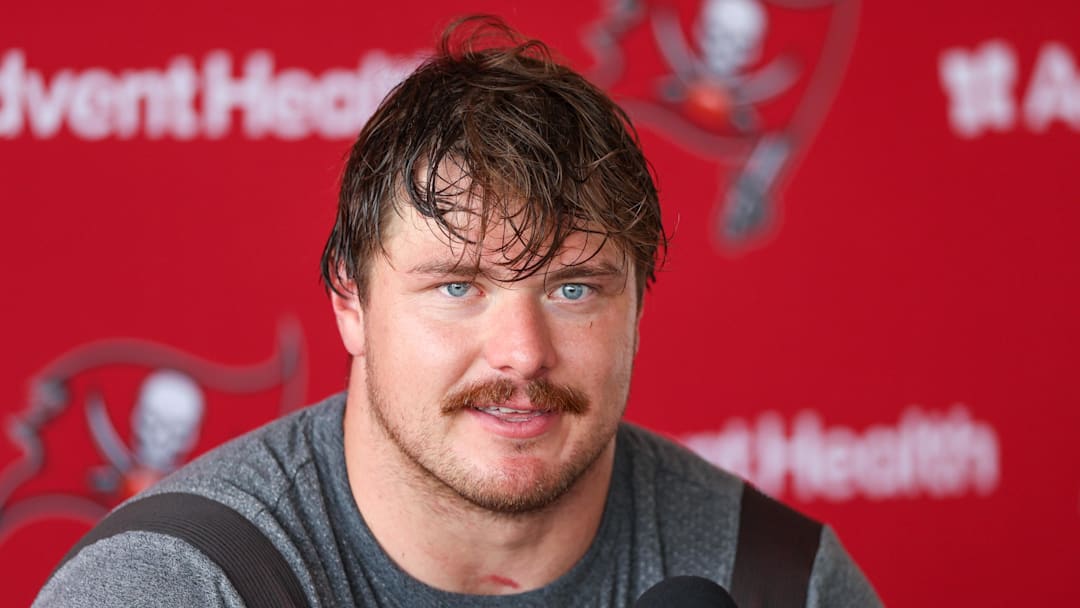 Tampa Bay Buccaneers offensive tackle Luke Goedeke (67) talks to media after training camp 