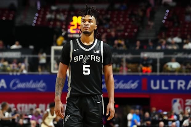 San Antonio Spurs guard Stephon Castle (5) walks up court during the third quarter against the Portland Trail Blazers. 