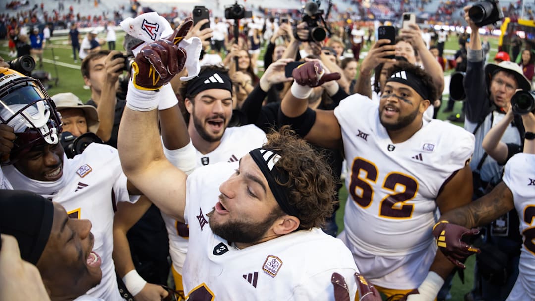 Nov 30, 2024; Tucson, Arizona, USA; Arizona State Sun Devils running back Cam Skattebo (4) celebrates after defeating the Arizona Wildcats during the Territorial Cup at Arizona Stadium. Mandatory Credit: Mark J. Rebilas-Imagn Images
