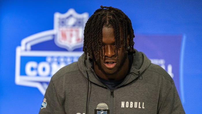 Mar 2, 2024; Indianapolis, IN, USA; Penn State offensive lineman Olu Fashanu (OL18)  talks to the