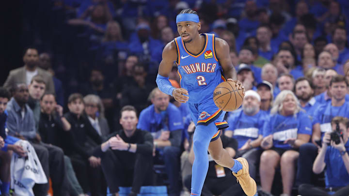 May 22, 2025; Oklahoma City, Oklahoma, USA; Oklahoma City Thunder guard Shai Gilgeous-Alexander (2) dribbles in the first quarter against the Minnesota Timberwolves during game two of the western conference finals for the 2025 NBA Playoffs at Paycom Center. Mandatory Credit: Alonzo Adams-Imagn Images