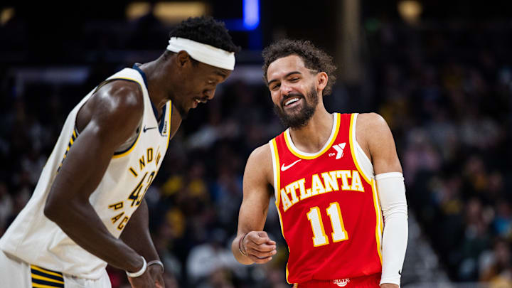 Indiana Pacers forward Pascal Siakam and Atlanta Hawks guard Trae Young share a laugh