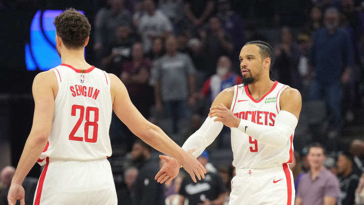 Mar 10, 2024; Sacramento, California, USA; Houston Rockets forward Dillon Brooks (right) slaps hands with center Alperen Sengun (28) before the game against the Sacramento Kings at Golden 1 Center. Mandatory Credit: Darren Yamashita-USA TODAY Sports