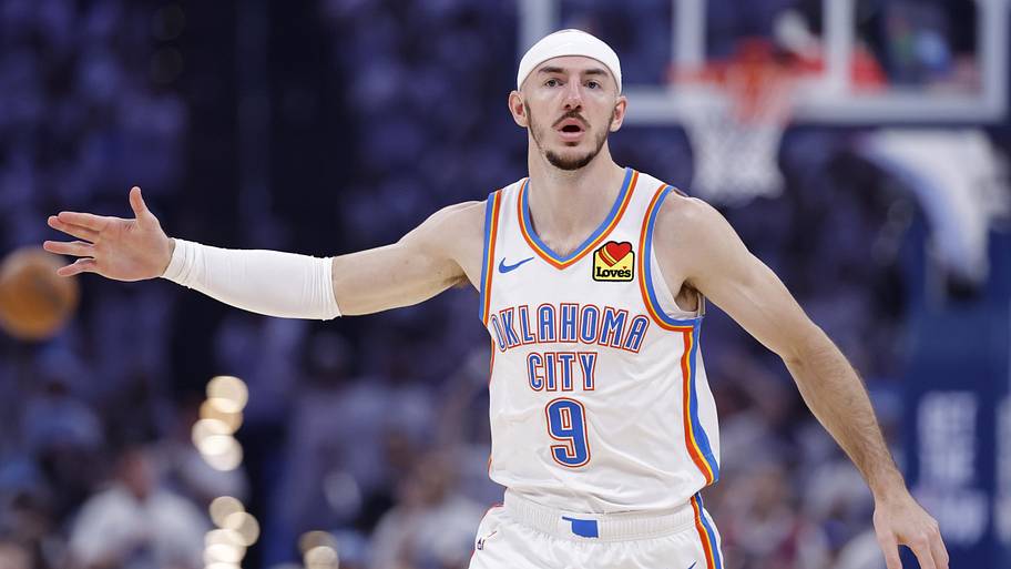 Oklahoma City Thunder guard Alex Caruso reacts after a basket during the first quarter against the San Antonio Spurs.