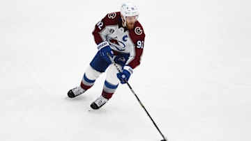 Jun 22, 2022; Tampa, Florida, USA; Colorado Avalanche left wing Gabriel Landeskog (92) against the Tampa Bay Lightning during game four of the 2022 Stanley Cup Final at Amalie Arena. Mandatory Credit: Mark J. Rebilas-Imagn Images