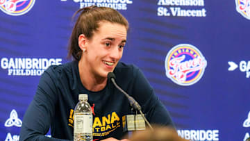 IndyStar sports reporter Chloe Peterson listens to Indiana Fever guard Caitlin Clark (22) answer a question on Friday, Sept. 13, 2024, during a game between the Indiana Fever and the Las Vegas Aces in Indianapolis. The Aces defeated the Fever, 78-74.