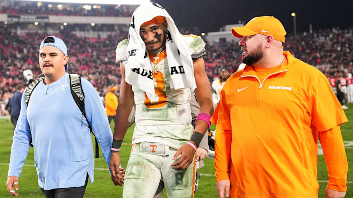 Tennessee quarterback Nico Iamaleava (8) walks off the field after a college football game between Tennessee and Georgia at Sanford Stadium in Athens, Ga., on Saturday, November 16, 2024. Tennessee quarterback Nico Iamaleava (8) walks off the field after a college football game between Tennessee and Georgia at Sanford Stadium in Athens, Ga., on Saturday, November 16, 2024.