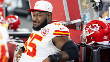Aug 9, 2025; Glendale, Arizona, USA; Kansas City Chiefs guard Trey Smith (65) against the Arizona Cardinals during a preseason NFL game at State Farm Stadium.