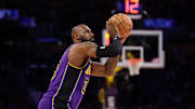 Mar 31, 2025; Los Angeles, California, USA;  Los Angeles Lakers forward LeBron James (23) shoots the ball during the first quarter against the Houston Rockets at Crypto.com Arena. Mandatory Credit: Kiyoshi Mio-Imagn Images