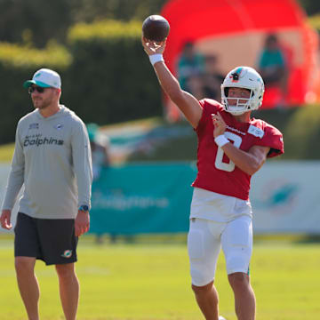 Miami Dolphins quarterback Zach Wilson (0) throws the football during training camp at Baptist Health Training Complex.