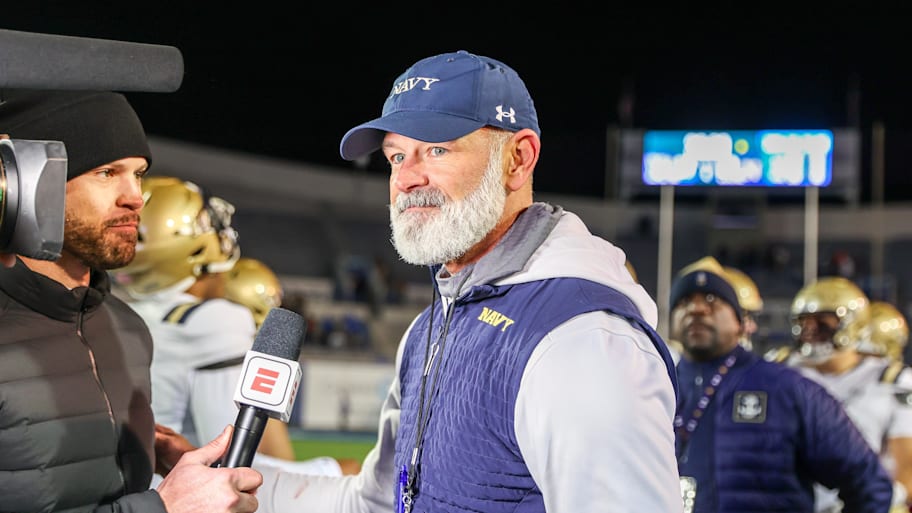 Brian Newberry gives an interview after a game against Memphis.