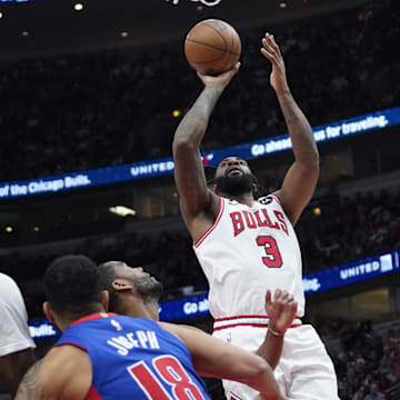 Dec 30, 2022; Chicago, Illinois, USA; Chicago Bulls center Andre Drummond (3) shoots over Detroit Pistons guard Cory Joseph (18) during the second half at United Center. Mandatory Credit: David Banks-Imagn Images