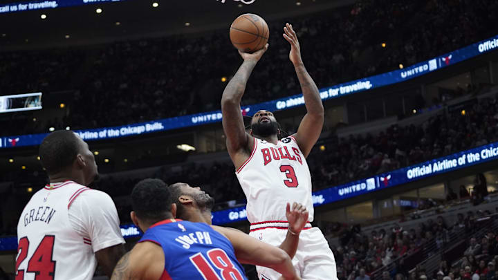 Dec 30, 2022; Chicago, Illinois, USA; Chicago Bulls center Andre Drummond (3) shoots over Detroit Pistons guard Cory Joseph (18) during the second half at United Center. Mandatory Credit: David Banks-Imagn Images