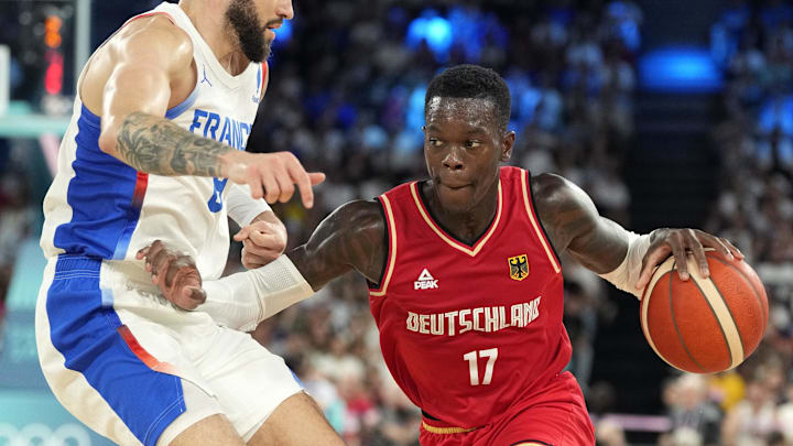 Aug 8, 2024; Paris, France; Germany point guard Dennis Schroder (17) dribbles the ball during the first half against France in a men's basketball semifinal game during the Paris 2024 Olympic Summer Games at Accor Arena. Mandatory Credit: Kyle Terada-USA TODAY Sports