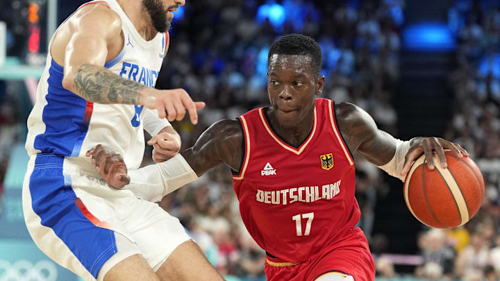 Aug 8, 2024; Paris, France; Germany point guard Dennis Schroder (17) dribbles the ball during the first half against France in a men's basketball semifinal game during the Paris 2024 Olympic Summer Games at Accor Arena. Mandatory Credit: Kyle Terada-USA TODAY Sports