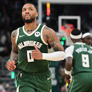 Milwaukee Bucks guard Damian Lillard (0) looks on in the second quarter against the Indiana Pacers during game one of the first round for the 2024 NBA playoffs at Fiserv Forum. 