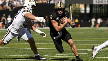Oct 18, 2025; Nashville, Tennessee, USA;  Vanderbilt Commodores quarterback Diego Pavia (2) runs with the ball against the Louisiana State Tigers during the first half at FirstBank Stadium. Mandatory Credit: Steve Roberts-Imagn Images