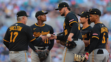 Mar 27, 2025; Miami, Florida, USA; Pittsburgh Pirates manager Derek Shelton (17) takes starting pitcher Paul Skenes (30) out of the game against the Miami Marlins during the sixth inning at loanDepot Park. Mandatory Credit: Sam Navarro-Imagn Images