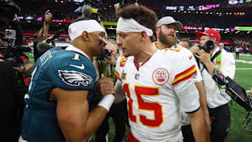 Feb 9, 2025; New Orleans, LA, USA; Philadelphia Eagles quarterback Jalen Hurts (1) shakes hands with Kansas City Chiefs quarterback Patrick Mahomes (15) after Super Bowl LIX at Ceasars Superdome. Mandatory Credit: Mark J. Rebilas-Imagn Images