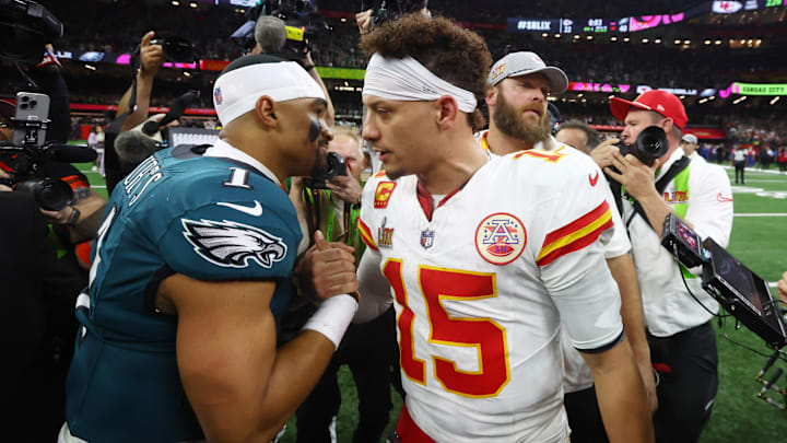 Feb 9, 2025; New Orleans, LA, USA; Philadelphia Eagles quarterback Jalen Hurts (1) shakes hands with Kansas City Chiefs quarterback Patrick Mahomes (15) after Super Bowl LIX at Ceasars Superdome. Mandatory Credit: Mark J. Rebilas-Imagn Images