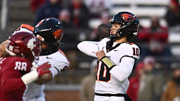 Nov 29, 2025; Pullman, Washington, USA; Oregon State Beavers quarterback Tristan Ti'A (10) throws a pass against the Washington State Cougars in the first half at Gesa Field at Martin Stadium. Mandatory Credit: James Snook-Imagn Images