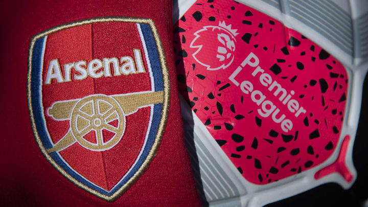 The Arsenal Club Crest with a Premier League Match Ball