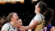 Iowa guard Taylor Stremlow (1) and Iowa center Ava Heiden (5) react Nov. 9, 2025 during a women’s basketball game against the Evansville Purple Aces at Carver-Hawkeye Arena in Iowa City, Iowa.