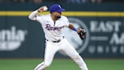 Sep 8, 2025; Arlington, Texas, USA; Texas Rangers shortstop Ezequiel Duran (20) throws the ball to first base during the seventh inning against the Milwaukee Brewers at Globe Life Field. Mandatory Credit: Tim Heitman-Imagn Images
