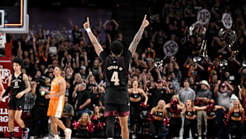 Feb 21, 2023; College Station, Texas, USA; Texas A&M Aggies guard Wade Taylor IV (4) reacts to their win over Tennessee Volunteers at Reed Arena. Mandatory Credit: Maria Lysaker-Imagn Images