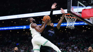 Jun 6, 2024; Boston, Massachusetts, USA; Boston Celtics guard Jaylen Brown (7) shoots against Dallas Mavericks center Daniel Gafford (21) in the third quarter during game one of the 2024 NBA Finals at TD Garden. Mandatory Credit: David Butler II-USA TODAY Sports