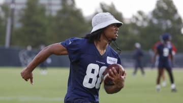 Jun 15, 2022; Houston, TX, USA; Houston Texans wide receiver John Metchie III (88) runs with the ball during minicamp at Houston Methodist Training Center. Mandatory Credit: Troy Taormina-USA TODAY Sports