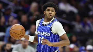 Oct 10, 2025; Philadelphia, Pennsylvania, USA; Orlando Magic guard Jase Richardson (11) dribbles the ball against the Philadelphia 76ers during the third quarter at Xfinity Mobile Arena. Mandatory Credit: Bill Streicher-Imagn Images