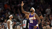 Nov 10, 2025; Phoenix, Arizona, USA; Phoenix Suns forward Royce O'Neale (00) celebrates a three point shot against the New Orleans Pelicans in the first half at the Mortgage Matchup Center. Mandatory Credit: Mark J. Rebilas-Imagn Images