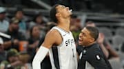 Oct 17, 2025; San Antonio, Texas, USA; San Antonio Spurs forward Victor Wembanyama (1) forward Keldon Johnson (3) bump chests before the game against the Indiana Pacers at Frost Bank Center. Mandatory Credit: Scott Wachter-Imagn Images