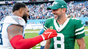 Tennessee Titans defensive tackle Jeffery Simmons (98) and New York Jets quarterback Aaron Rodgers (8) talk after their game at Nissan Stadium in Nashville, Tenn., Sunday, Sept. 15, 2024. The visiting Jets came out on top 24-17.