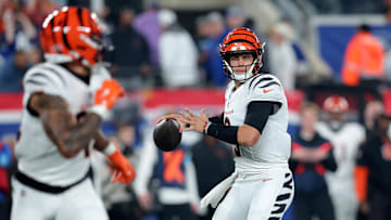 Oct 13, 2024; East Rutherford, New Jersey, USA; Cincinnati Bengals quarterback Joe Burrow (9) drops back to pass against the New York Giants during the first quarter at MetLife Stadium. Mandatory Credit: Brad Penner-Imagn Images