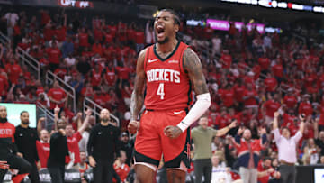 Apr 23, 2025; Houston, Texas, USA; Houston Rockets guard Jalen Green (4) reacts after scoring a basket during the third quarter during game two of the first round for the 2024 NBA Playoffs against the Golden State Warriors at Toyota Center. Mandatory Credit: Troy Taormina-Imagn Images