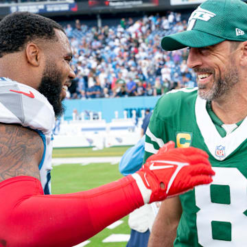 Tennessee Titans defensive tackle Jeffery Simmons (98) and New York Jets quarterback Aaron Rodgers (8) talk after their game at Nissan Stadium in Nashville, Tenn., Sunday, Sept. 15, 2024. The visiting Jets came out on top 24-17.