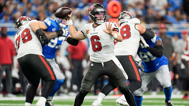 Buccaneers’ Baker Mayfield makes a pass against the Lions.