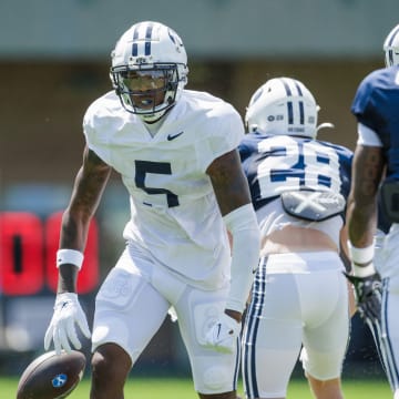 Darius Lassiter hauls in a contested catch during BYU's first scrimmage